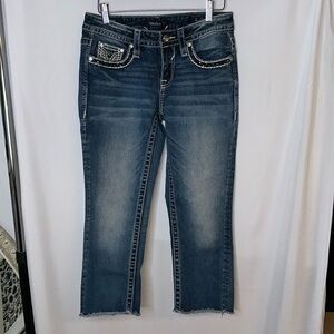 Vigoss Heritage Capri’s size 2. Embellished and raw hem.